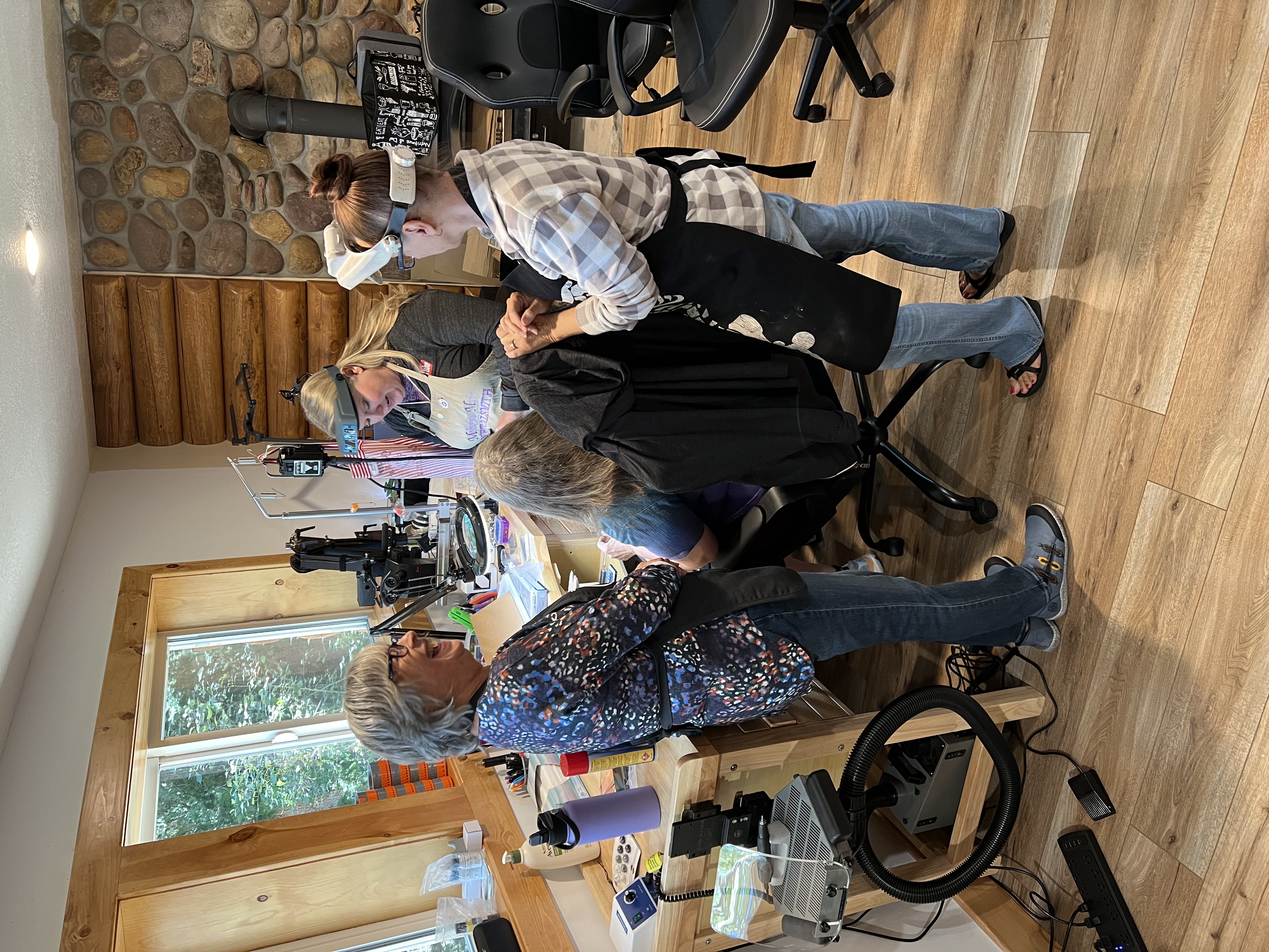 Makers collaborating and laughing in studio